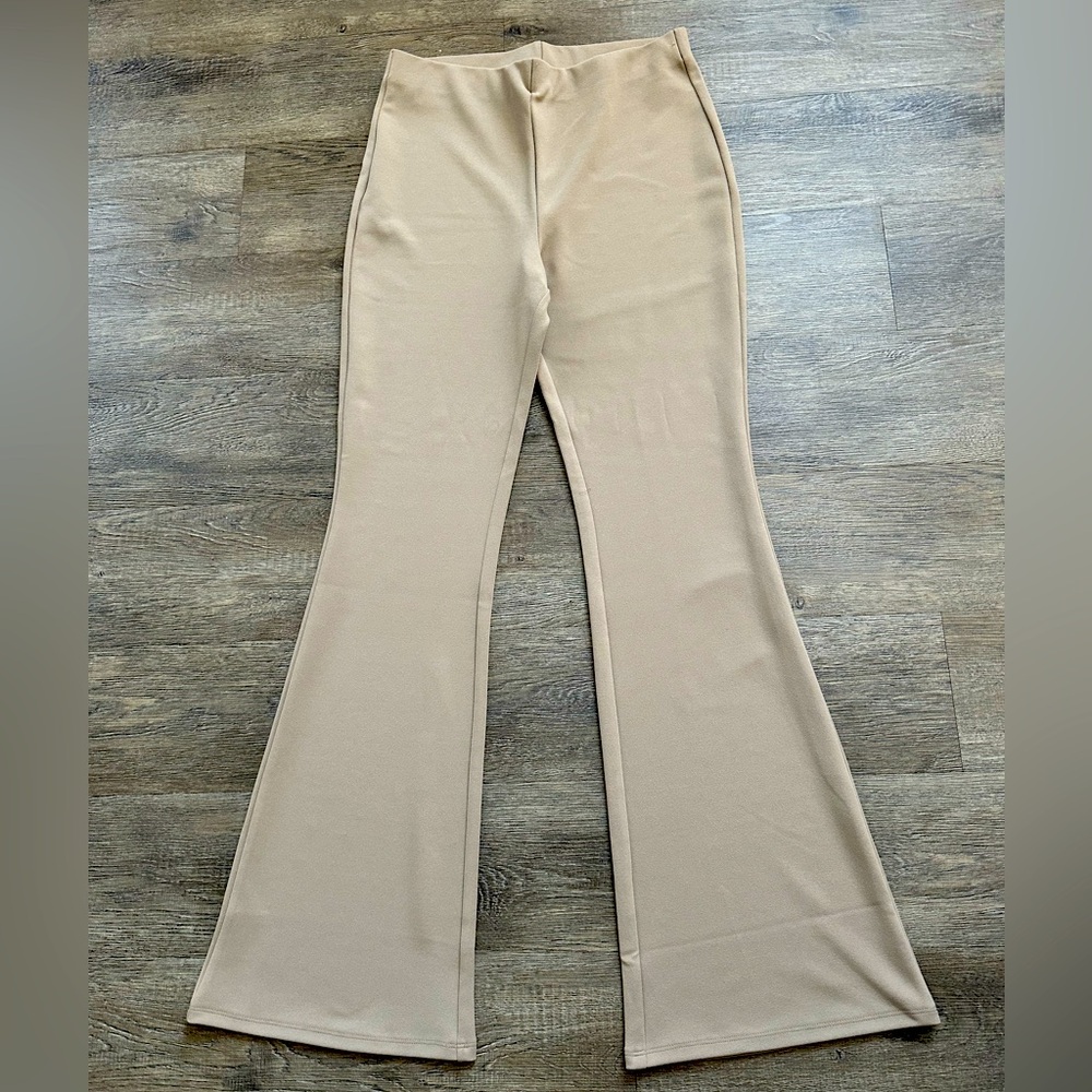 H&M pants women flared size M Tan color .stretchy and comfortable. No pockets